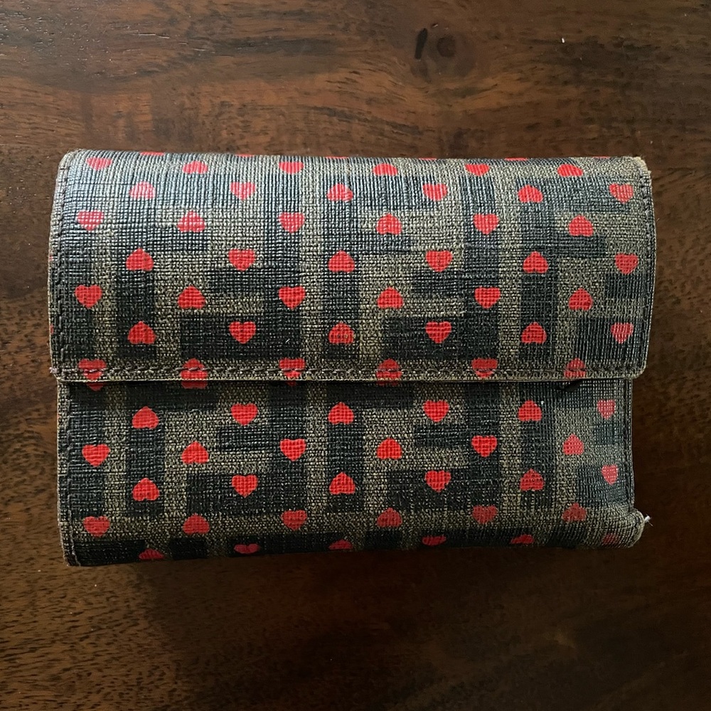 Fendi women’s brown wallet with red hearts